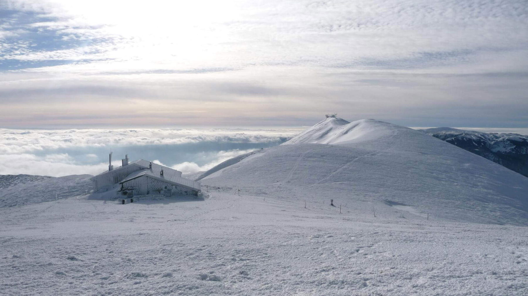Blick vom Kaiserstein auf die Fischerhütte und das Klosterwappen.