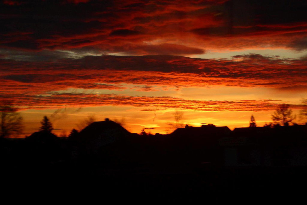 Aus dem Zug fotografiertes Morgenrot.