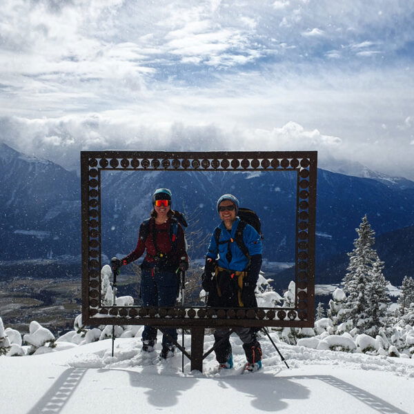 Just am prädestinierten Aussichtspunkt blinzelt kurz die Sonne durch. Im Hintergrund das schneelose Inntal. Foto: Niklas, POW AT